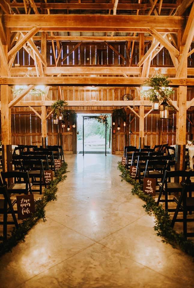 Indoor ceremony barn wedding Kansas City Photography: The Bold Americana / Vera Gayazov Photography Venue: Tobacco Barn Farm